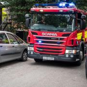 CHALLENGE: Firefighters are presented with a challenge if cars are badly parked as this photo illustrates