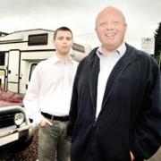 UPBEAT: Mike Lake, who runs Three Counties Caravans in Welland, with his son Tony. Mr Lake says local traders will always battle on through economic ups and down.  23011003