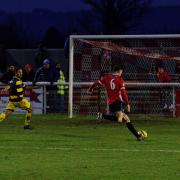 Kyle Belmonte scores the winner for Evesham United. Pic: Stuart Purfield