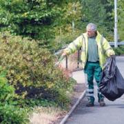 HARD AT WORK: Worcester City Council employee Trevor Tongue clears litter in George Street, Worcester. 28043402