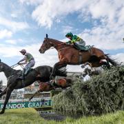 Minella Times ridden by Rachael Blackmore clears the water on the way to victory in the Grand National at Aintree last year