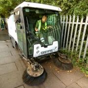 CLEAN SWEEP: Worcester City Council operational cleaning team working in Prestbury Close, Blackpole, yesterday with Ray Webb busy at the wheel of a Johnston compact sweeper during a tough operation. Picture by John Anyon. 29047101.