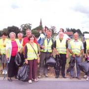 DEDICATED: Hallow Village Community Group are often to be seen out in force clearing up their neighbourhood streets.