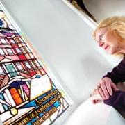 TAKING A LOOK AROUND: Mary Devereux admires an original stained glass window in the chapel (36084503)