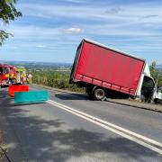 LUCKY: The lorry perched on the edge of a steep drop near British Camp. Photo: Ledbury Fire Station
