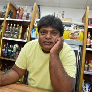 Dilan Mendis, the owner of Bath Wines, chased away two would-be robbers from his shop. All photos: SWNS