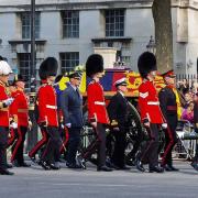 RESPECT: The Queen's coffin makes its way through Whitehall on its way to Westminster Hall. Picture Mark Evans.