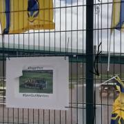 SUPPORT: Fans have tied messages of support for Worcester Warriors on the fences at Sixways Stadium.