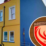 Andy Munn has painted his house the colours of Worcester Warriors, despite living just metres away from Gloucester Rugby's stadium.