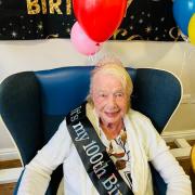 Loni Gumbley enjoys her 100th birthday.