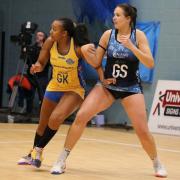 Severn Stars’ goal shooter Sigi Burger (right) competes for the ball with Team Bath defender Summer Artman
