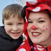 Paula Pearson has been dressing up while taking her son to school