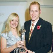 PLEASED: Sian Webley, pictured with paralympic swimmer Sascha Kindred, has found apprenticeships beneficial.