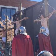 FAITH: The Crucifixion depicted in the Passion Play at Cathedral Square in Worcester with the Bishop of Worcester on the left
