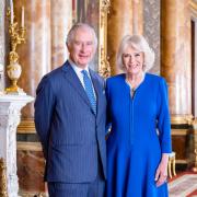 Handout photo dated March 2023 issued by Buckingham Palace of King Charles III and the Queen