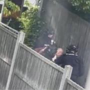 POLICE: Police were filmed restraining a man near Sainsbury's Blackpole.