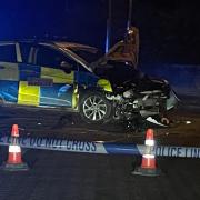 Police car following a crash on Elm Road, Evesham, in January 2022