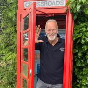 FANTASTIC: Actor Clive Mantle outside the Crossroads phone box in Powick.