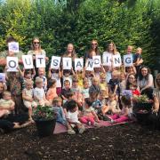 CELEBRATE: Children and staff at Poppins Day Nursey in Worcester who are celebrating an 'oustanding' rating from inspectors Ofsted