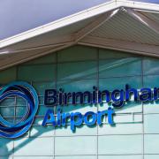 Birmingham Airport is asking customers to put hand luggage in the aircraft hold to limit delays