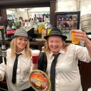Melissa Bywayer (left) and Jess Gadsby pull pints at Salt Fest on behalf of organisers The Gardeners Arms in Droitwich