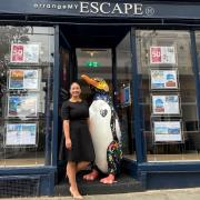Jennifer Lynch, general manager at arrangeMY Escape, with Spirit the Penguin.