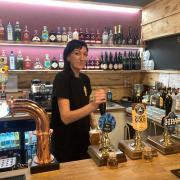FRIENDLY: Chloe Wright serves behind the bar at Ale Hub in St Peter's Drive, Worcester