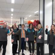 Barbra Frizzell, store manager (centre) along with former Wilko staff at Poundland opening.
