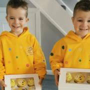 Tracey Walker sent in this picture of George and Jacob, age 5, off to school with some tasty cupcakes.