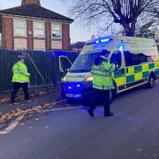 EMERGENCY: An ambulance on blue lights at the scene where a boy, six, was hit by a car in Stanley Road, Worcester