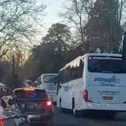 COACHES: Police were filmed escorting coaches as they made their way towards the Worcester Victorian Fayre.