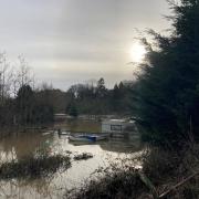 FLOODING: The flooding at Holt Heath by the bridge