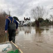 FLOODS: The Camp House Inn in Grimley has always adapted to the floods including using a boat to ferry customers to and from the pub but it's becoming increasingly difficult