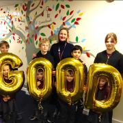 CELEBRATE: Lucy Cox, head of Martley Primary School, celebrates a 'Good' Ofsted with pupils