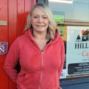 WELCOME: Jane Fletcher, owner of Hill Top Cafe at Holt Heath, which reviews describe as a hidden gem