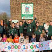 GOOD IS GREAT: Children and staff celebrate Wishing Well's new Ofsted rating.