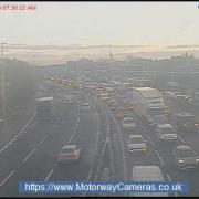 DELAYS: The situation at junction 1 of the M5 as overrunning roadworks cause delays
