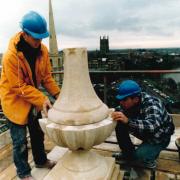 Stonemason James Mason works on the pinnacles with colleague Ryan Harris in 1994