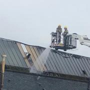 DRAMATIC: Firefighters tackle the fire at Priory Dry Cleaners off Bromyard Road in St John's in Worcester