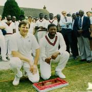 Members of both the Worcester and Barbados Police pose for the camera after their game of cricket in 1994