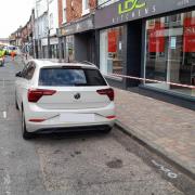 The Volkswagen remained parked in Malvern Road despite the road closure.