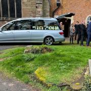 The hearse arrives at St Augustine Church in Droitwich
