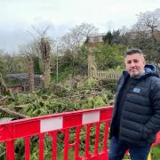 WORRY: Adam Giagnotti, owner of the Olive Branch and  Impasto, in his garden after the Reservoir Lane wall collapse in February