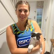 Pershore’s Claire Elston, pictured with her cat Minty, will be doing the London Marathon for the local RSPCA branch