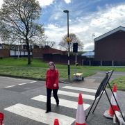 WORK: Cllr Jill Desayrah on the freshly painted crossing in Windermere Drive in Warndon in Worcester