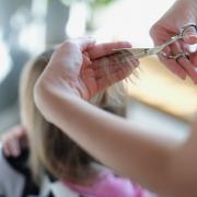 The hairdresser has applied for permission to do her job from her family home