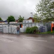 J-Mart Warehouse's Malvern store is being blocked by B&Q's outdoor racking as demonstrated by sales assistant Chris Jones