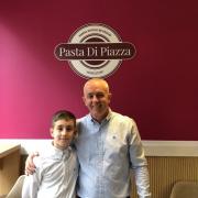 Business owner Gaz Cani alongside his son Ethan.
