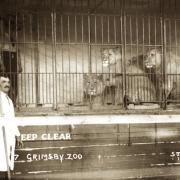 Arthur ready to intervene to help his nephew in the cage in 1933, far left.