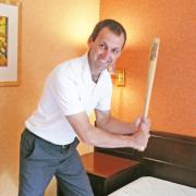 PRACTISE WHAT THEY PREACH: Karen Kingston’s husband Richard Sebok tries his hand at the art of bed thwacking.